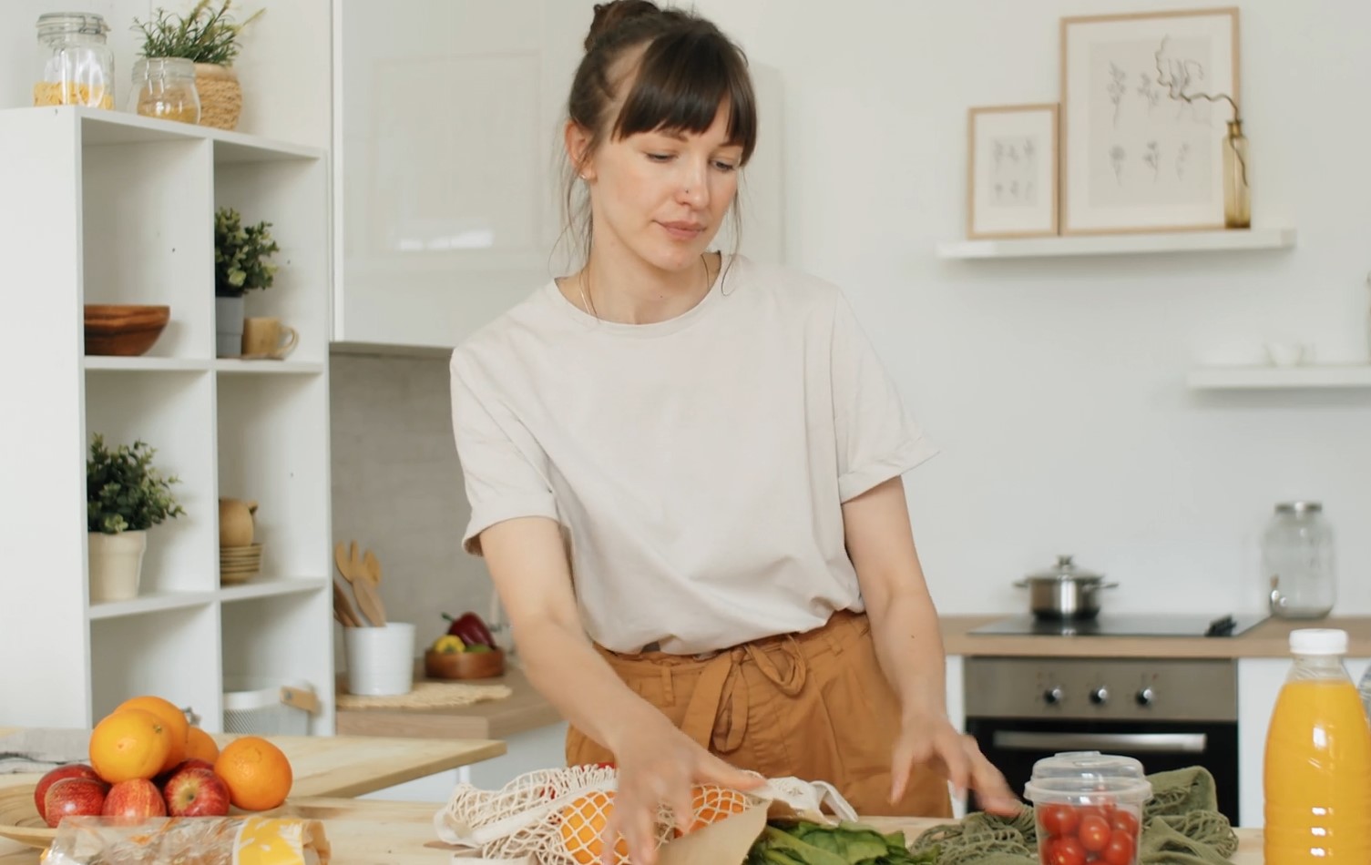 Woman preparing food for cooking in a kitchen